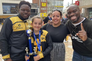 JP Omari, Monique Matthews &Munya Muchati with Olive after winning UDO worlds 2023