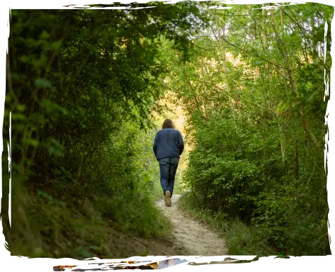 A man walking in a forest